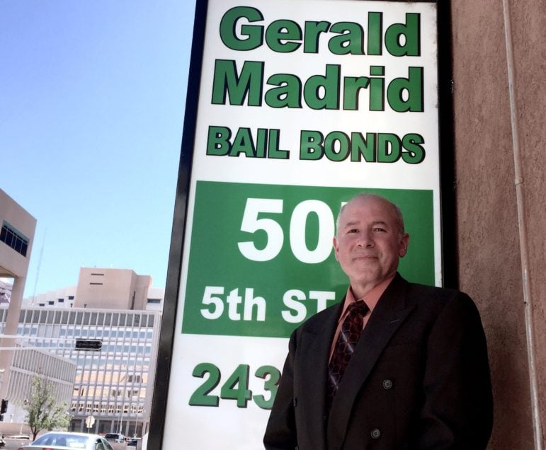 Bail bondsman Gerald Madrid, standing outside his Albuquerque office, thinks New Mexico's money bail system does not need to be reformed. 